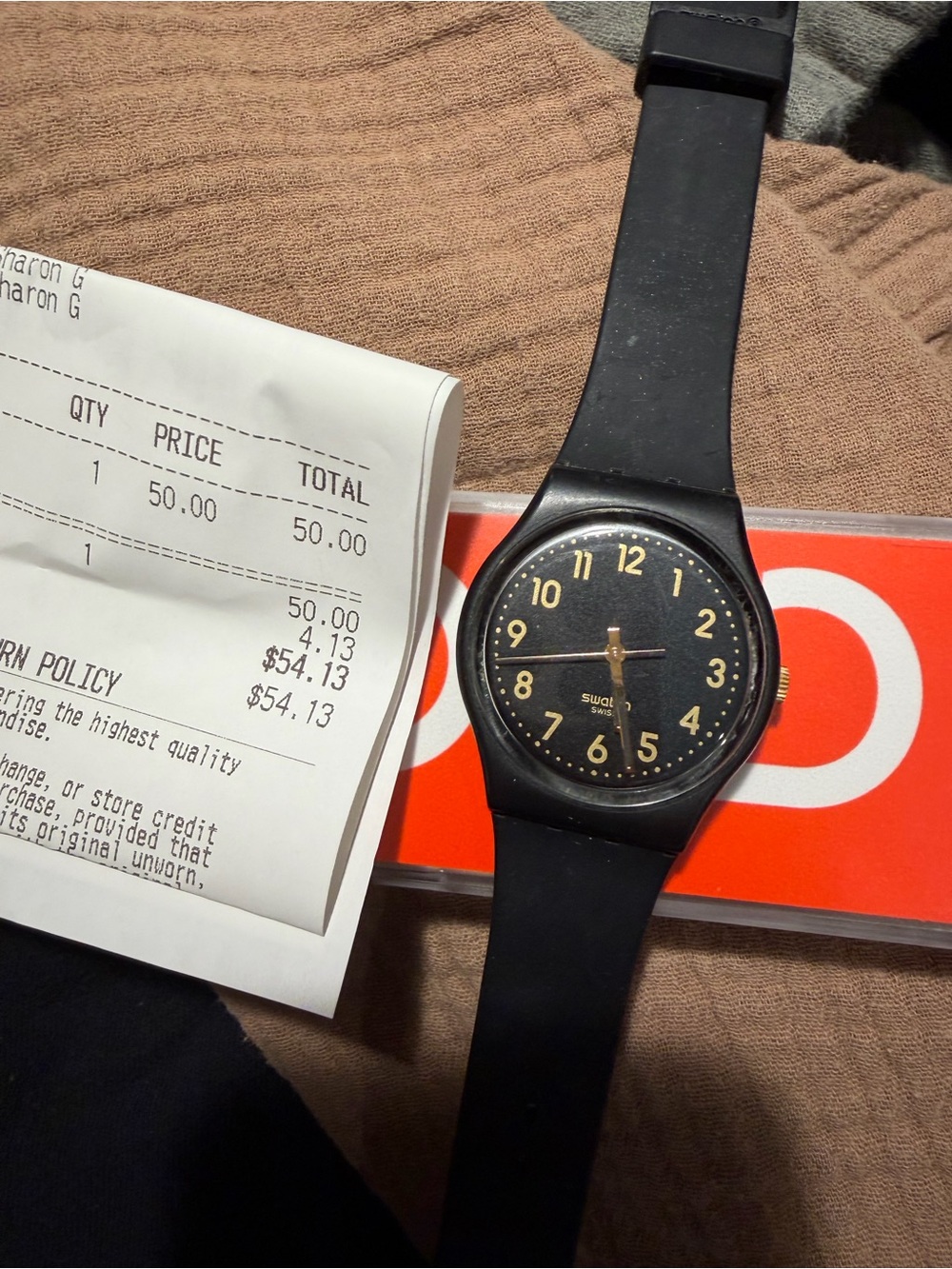 Swatch Black Watch with Gold Numerals and Hands